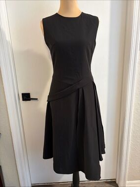 Few Moda black sleeveless dress interesting details at waist unique size small